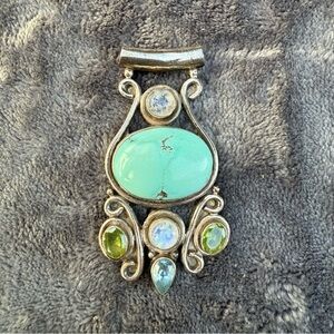 Elegant Silver Pendant with Oval Turquoise stone, Peridot, an Moonstone accents